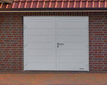 Pose d'une porte de garage motorisée deux vantaux à Evenos